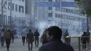 March led by Bolivian leader Evo Morales ends in clashes as it enters capital La Paz