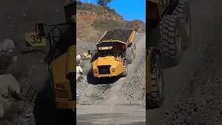 CAT Truck tackles steep slope!