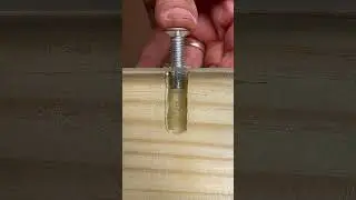 Hot glue trick to secure a wall-embedded nut. #woodworking #short