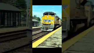 Railfanning in Geneva, Illinois:  Union Pacific Freight Train Zipping Through Geneva, Illinois