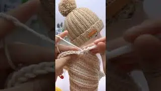 This is an example of knitting to make a small child's hat.