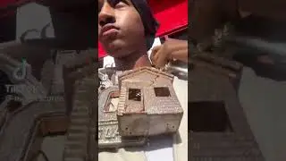Boy Flexing Big Boogie Homeboy Chains