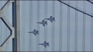 US NAVY Blue Angels quartet swoops around San Francisco Bay Bridge and over Treasure Island