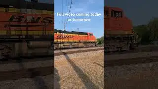 BNSF warbonnet trails with a friendly crew.
