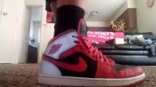 Jordan 1 Mid Fire red, cement grey, reflective design.