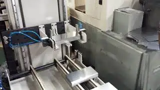 Automatic sheet transferring robot system with slitter