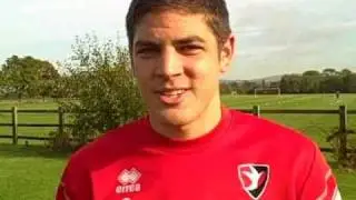 Cheltenham Town left-back Danny Andrew speaks to Jon Palmer ahead of  Aldershot away