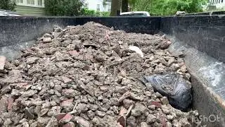 Dumpster Rental Business: Overloaded trailer and bad weather.