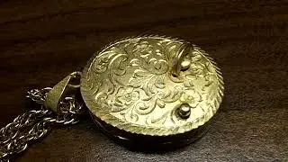 Vintage Swiss Reuge Miniature music box pendant Sterling Silver Case