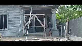Relif rumah ful dinding dan tiang klasik tampakdepan