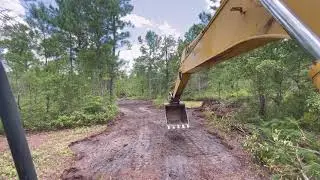 Part 2 clearing with Komatsu PC200 and Case 550G