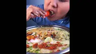 EATING POITA BHAT WITH ALOO PITIKA, BRINJAL FRY, SPICY CHUTNEY, PUMPKIN LEAF, MUSTARD LEAF