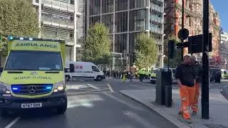 UK: Just Stop Oil protestors stop ambulance trying to get to the hospital on London's Oxford Street.