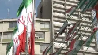 US extends sanctions relief on Iran but adds other sanctions