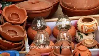 Decorative earthen lamps and statues for sale in local market of Chennai
