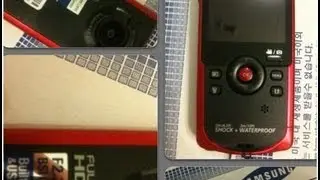 Unboxing the Samsung W200 HD 1080p shock and waterproof digital video camera.
