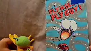 Reading the kids book: Fly High Fly Guy!