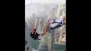 Multiple skydivers leaping from Dubai&rsquo;s tallest building #DubaiSkydiving #BurjKhalifa