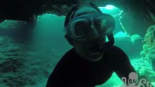 Swimming through an underwater cave in Crete