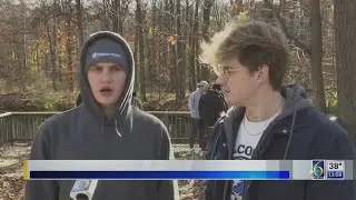 Volunteers pull debris from Red Cedar River