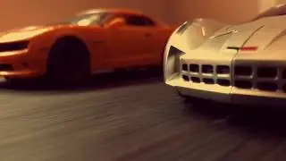 Transformers, MPM Barricade chasing Sideswipe LS-08 & MPM Bumblebee (stop motion).