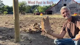 Wood Fence Post In Rock