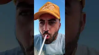 Drinking SAND through a straw on the beach ?? #crazy #beach #guy
