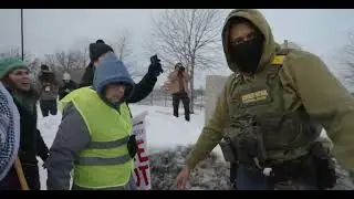 Hundreds Confront ICE Agents Outside Federal Building After Minnesota Shooting  