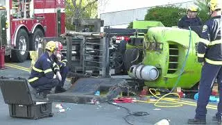 Firefighters Rescue Man Trapped Under Forklift
