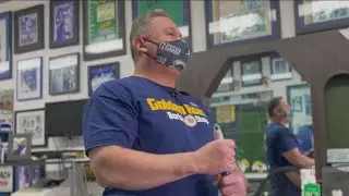 Barber shop owner shows off dedication as Rams fan
