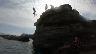 Leaping from cliffs - ace things to do Northumberland. KA Adventure Sports #coasteering #beadnell