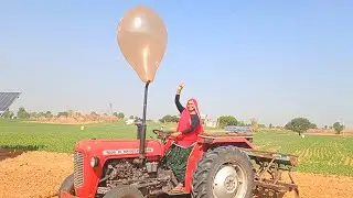 Village lady experiment balloon vs tractor experiment - woman lady tractor driver #giantwaterballoon