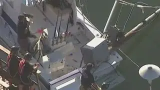 Two fisherman injured after crane falls onto boat