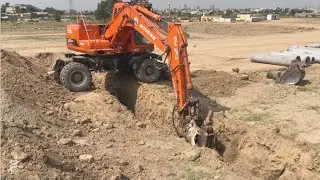 Excavator Rock Breaking In Excavation 