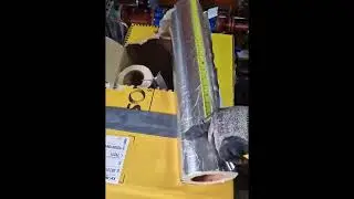 Insulating a 90 degree elbow with fibreglass pipe insulation. | Buy Insulation Online