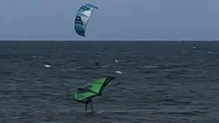 Wing surfing with a stand up paddle foil board