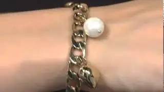 Juicy Couture Iconic Pre-Assembled Charm BraceletSKU#:7910492