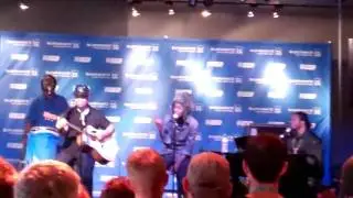 Positive Impact Magazine- K'Naan, Wavin' Flag