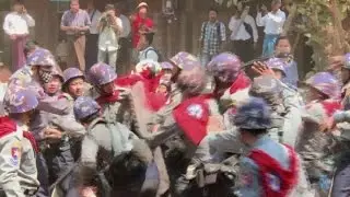Myanmar police beat students in protest crackdown