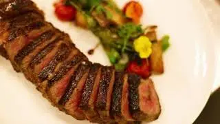 NY Strip Loin with Shishito Peppers and King Trumpet Mushrooms | JING Restaurant Las Vegas