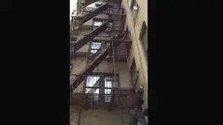 Iron welding fire escape painting New Rochelle.