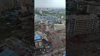 dispute land back side Dosti plant north. shill #mumbra