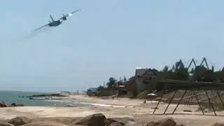 Ukraine Air Force An-26 low pass over Azov sea