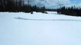 Counter steer turn on a snowmobile.