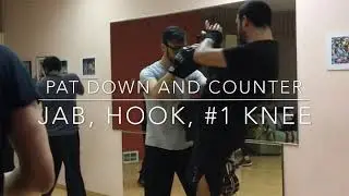 Muay Thai Techniques | pat down and counter strike followed by the Muay Thai #1 knee.