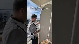 Our room Steward opening our balcony divider on Disney Fantasy. #cruise #disneycruise #balcony