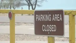 Beach parking lot closure leads to protest