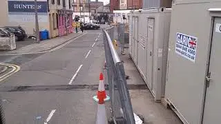 Idiot driving wrong way up a one way street.