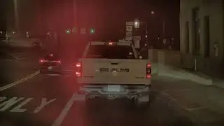dodge ram and undercover police suv almost collide - left lane turn from right - Tesla Video Clips