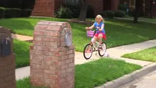 Mark and Haley ride their bikes